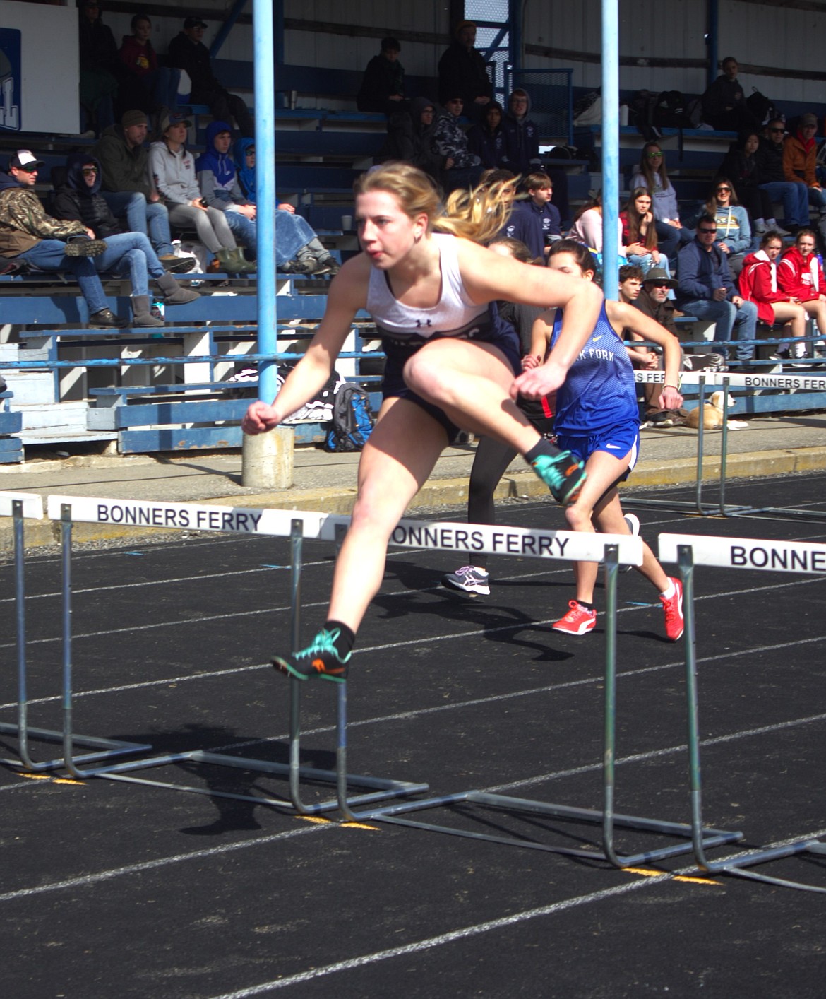 Lindsey Onstott runs the 100m for the Badgers at the BF Invite on March 18.