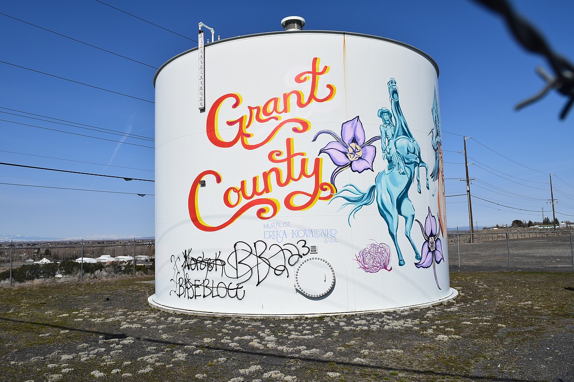 Some of the work of local artist Erika Kovalenko on the side of the Grant County Fairgrounds water tower on Airway Drive.
