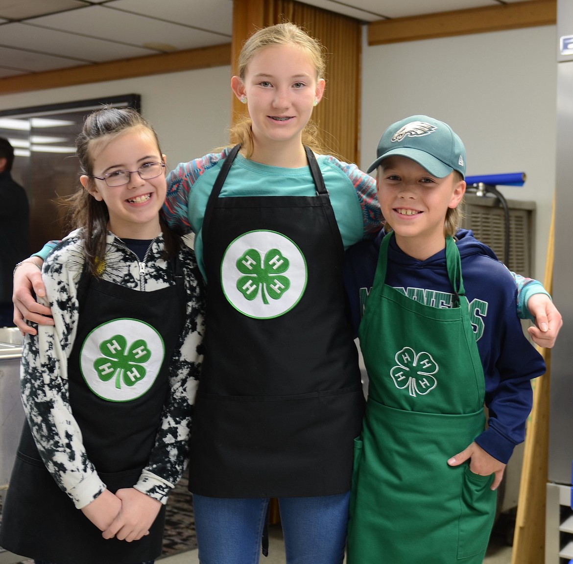 Aubree Blevins, Lendalyn Martin and Cooper Martin, all members of the Mission Mountaineers 4-H Club, were on duty last Friday night for the annual Ag Appreciation Dinner in Ronan. (Kristi Niemeyer/Leader)