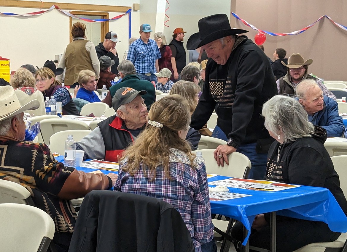 After a long winter, the annual Ag Appreciate Banquet in Ronan is a welcome opportunity for friends to gather. (Susan Lake photo)