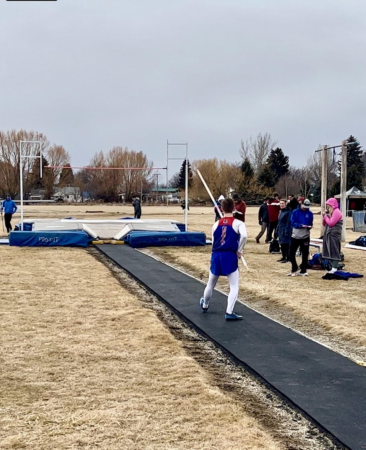 Superior eighth grader Gannon Quinlan eyes the pole vault bar prior to an attempt during this Saturday's Blue Devil Invitational track meet in Corvallis. (Photo provided)