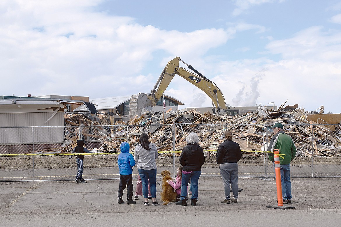 Seventy years later, the building came down on Monday to make way for parking for the new Glacier Gateway Elementary school. (Chris Peterson photo)
