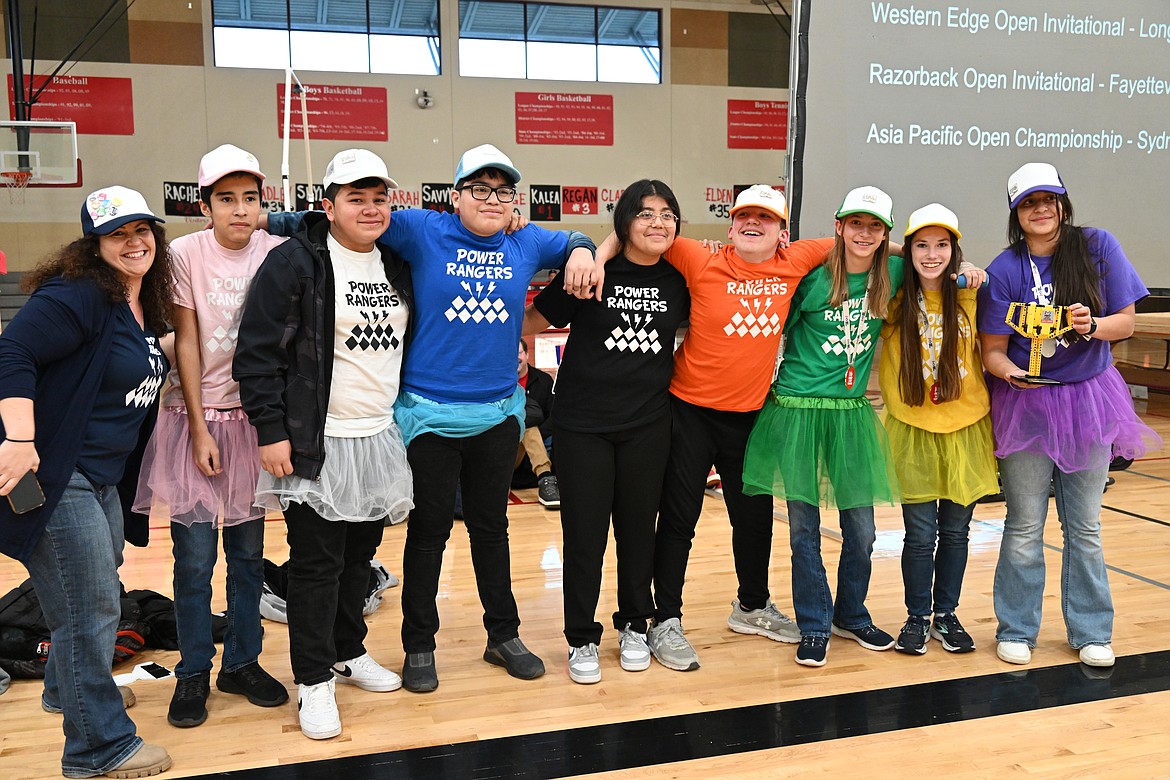 The Royal Middle School Power Rangers robotics team members wear color-coded T-shirts and tutus for easy identification. The Rangers insisted on the tutus, their teacher Theresa Piper said. From left: Theresa Piper, Victor Sandoval, Jaime Hernandez, Alex Arreguin, Jeralyn Roncon, Bryson Piper, Sarah Freeman, Rebecca Carlson and Rosario Bujenda. Not pictured is Manny Alcala.