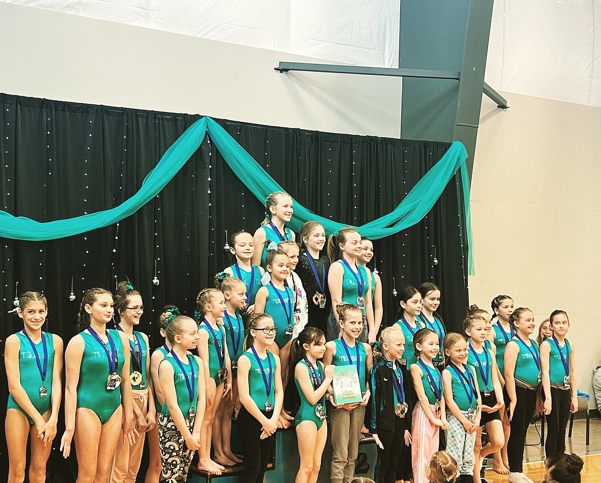 Courtesy photo
Technique Gymnastics recently hosted its seventh annual Snowglobe meet in Post Falls. In the front row from left are Shea Clayton, Aspen Sisson, Kanine Parker, Elli Bennett, Ruthie Ortiz, Gigi Mukhamediyev, Averie Kendall, Staci Sahm, Kai Hundt, Tayt Engle, Mia Jones, Harmonie Michael and Hailey Michael; and back row from left, Mackenzie Brockett, Amy Montandon, Khloe Giao, Madie Dowiak, Harmony Wurster, Maddi Justensen, Ragon McCracken, Gianna Wilson, Abby Martin, Paige Carey, Michaela Simhauser and Abi Hector.