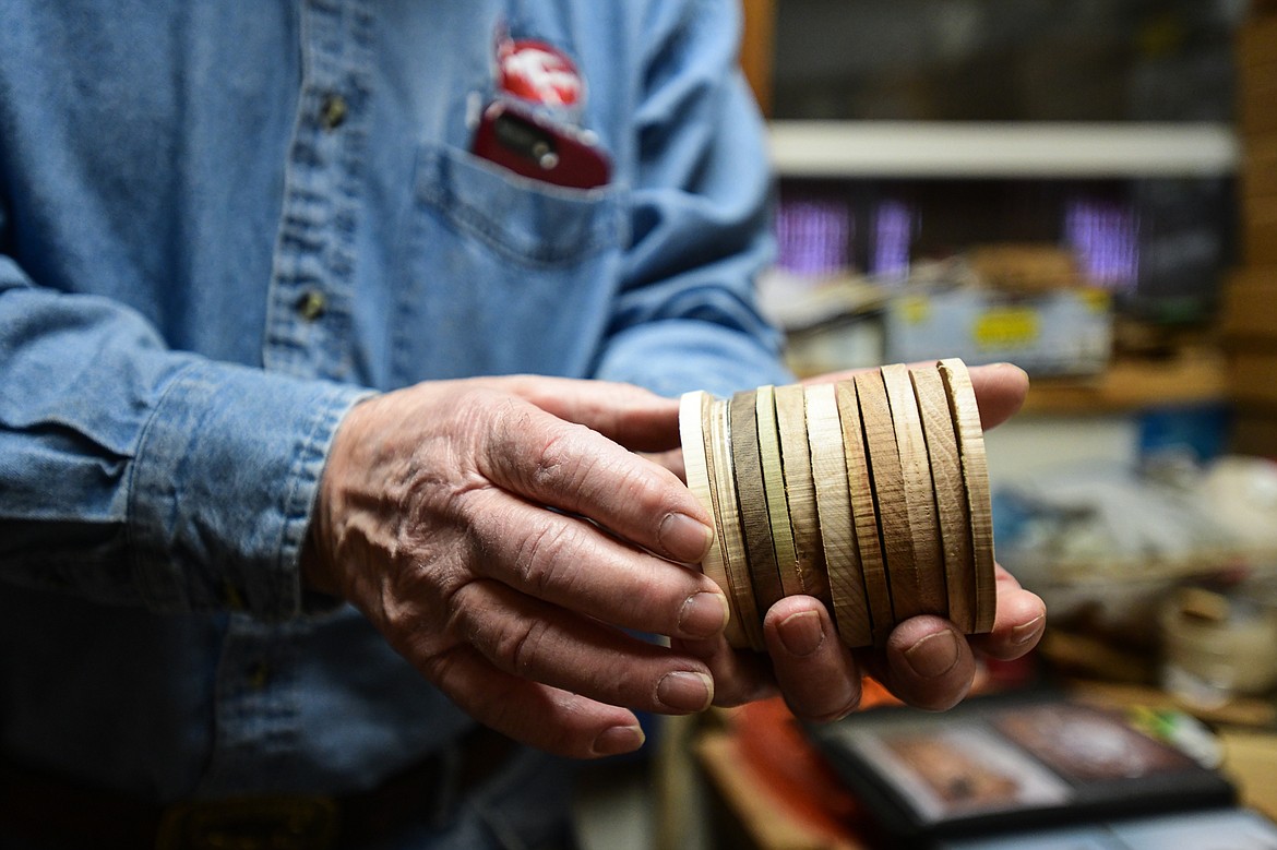 Ron Kelley holds a set of wooden discs similar to the ones in the gavel he created used by Kevin McCarthy, Speaker of the U.S. House of Representatives and Congressman in California's 20th District, on Tuesday, March 28. (Casey Kreider/Daily Inter Lake)
