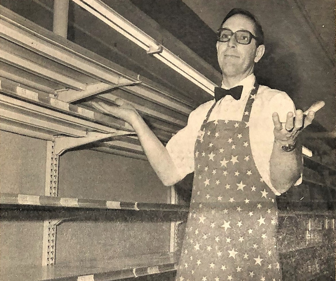 Ron McIntire of Ron's Thrift shrugs at empty saccharine shelves.