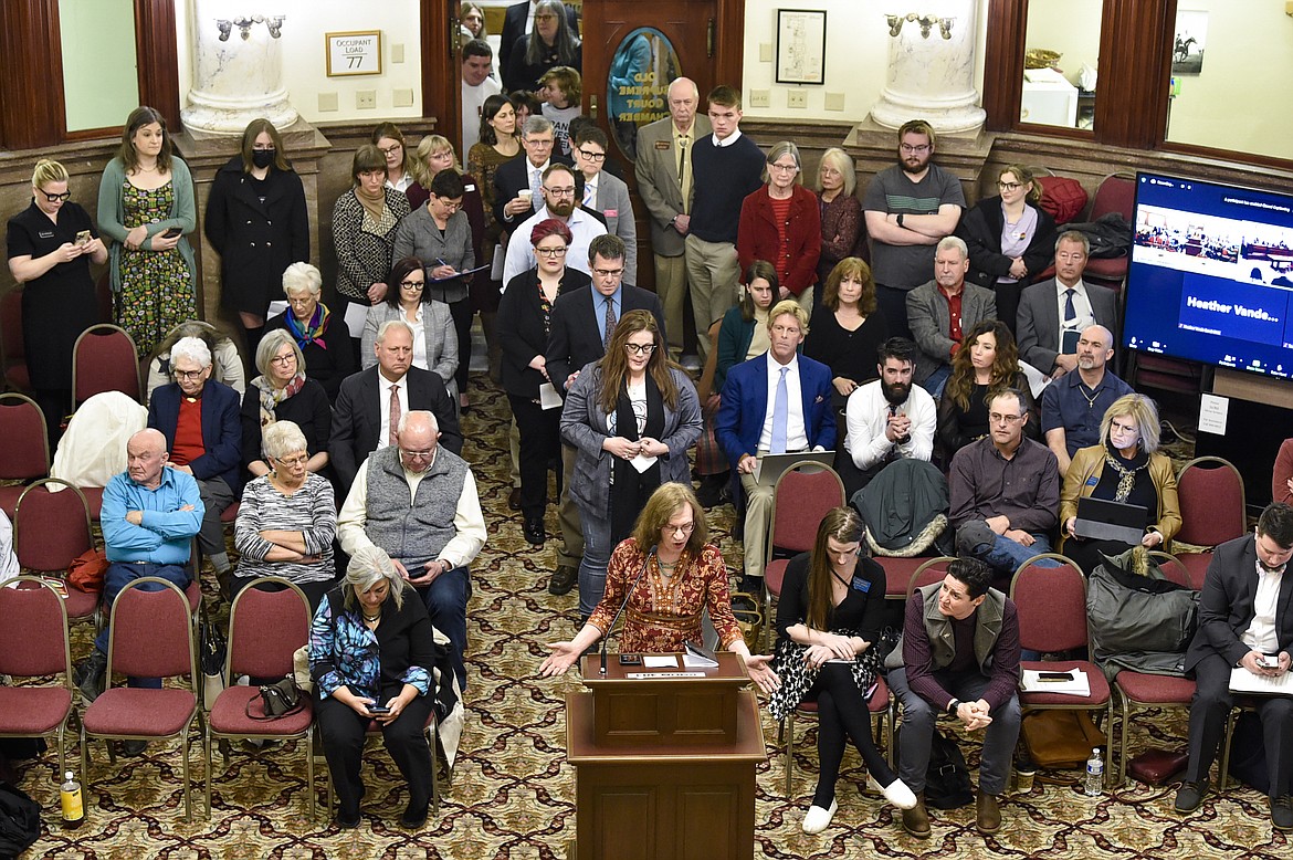 Opponents of SB99, a bill banning gender-affirming medical care for transgender minors, line up out the door of the Senate Judiciary Committee on Jan. 27, 2023, in the State Capitol in Helena. (Thom Bridge/Independent Record via AP, File)