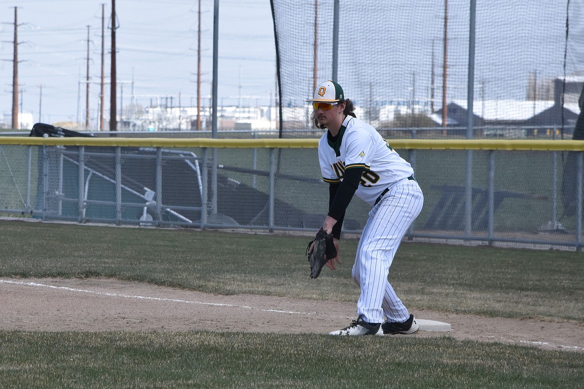 Quincy senior captain Caden Cameron stands on first base during a Jackrabbit game in 2022.