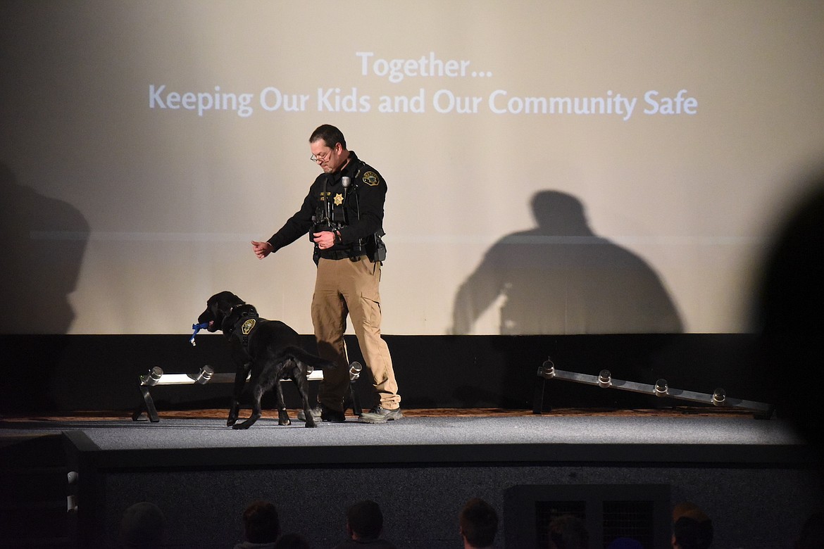 Lincoln County Sheriff's Office K-9 Officer John Hyslop put on a presentation during a program about fentanyl on Thursday, March 30. (Scott Shindledecker/The Western News)