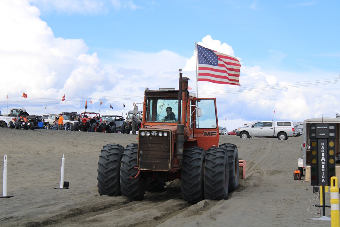 Lyle Labes grooms the race track with the club tractor getting everything ready for the big event.