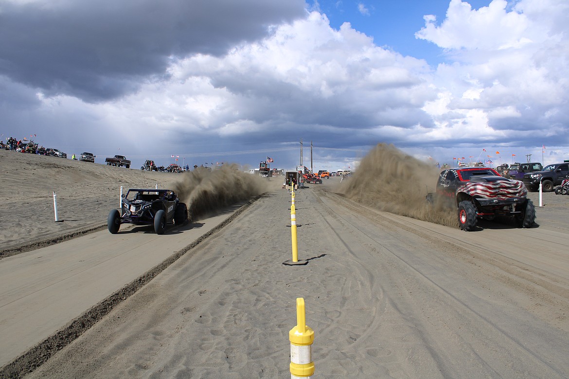 Butch, driven by Garrett Blauert (left), and the Dirty Dog II, driven by Brian Hesse (right), put on the fastest race of the day with Blauert taking the win.