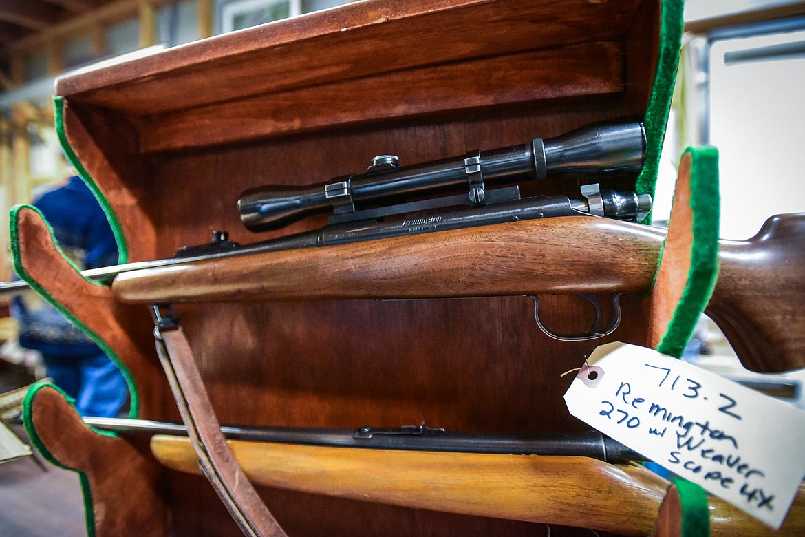 Two rifles up for auction up for auction at the 57th annual Creston Auction on Saturday, April 1. The Creston Auction and Country Fair is the largest annual fundraiser for the all-volunteer Creston Fire Department and has been held in Creston since 1966. (Casey Kreider/Daily Inter Lake)