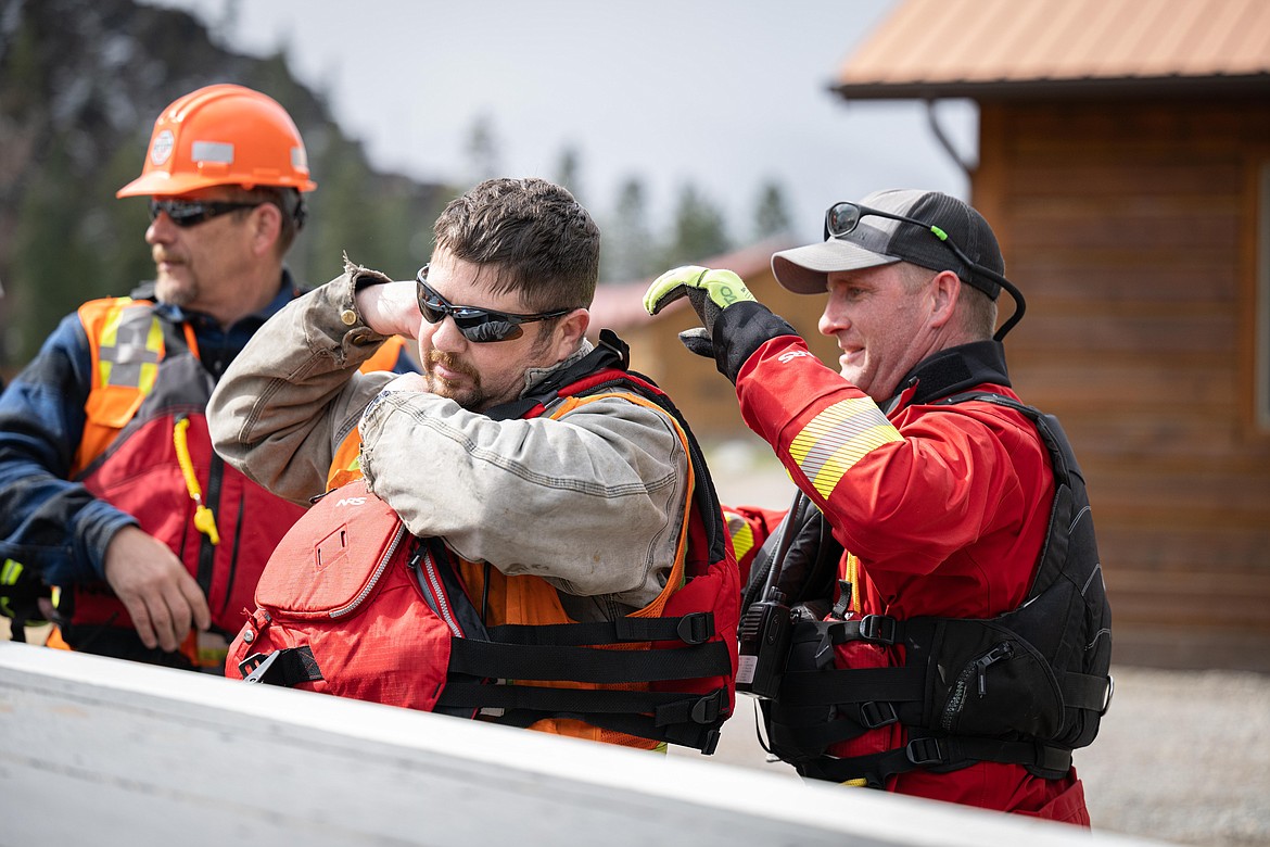 Plains Paradise Water Rescue team leader Zach Vanderwall suits up with cold water rescue equipment. (Tracy Scott/Clark Fork Valley Press)