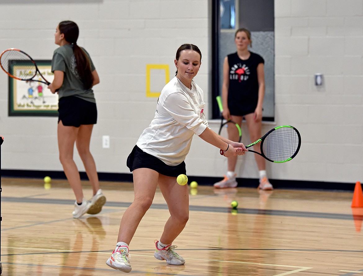 Whitefish's Colby Wharton readies to hit the ball during a drill at practice in the Muldown gym on March 22. (Whitney England/Whitefish Pilot)