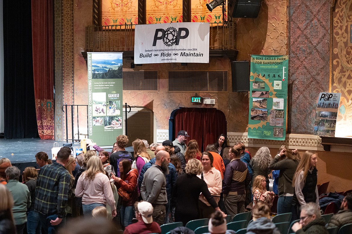 No Man's Land Film Festival attendees talk during a break at the March 31 event.