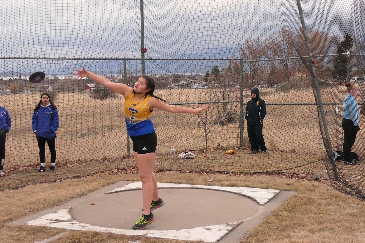 Thompson Falls discus thrower Veronica Bewick lets the discus fly during Friday's Dave Tripp Memorial track and field meet in Polson.   (Chuck Bandel/VP-MI)