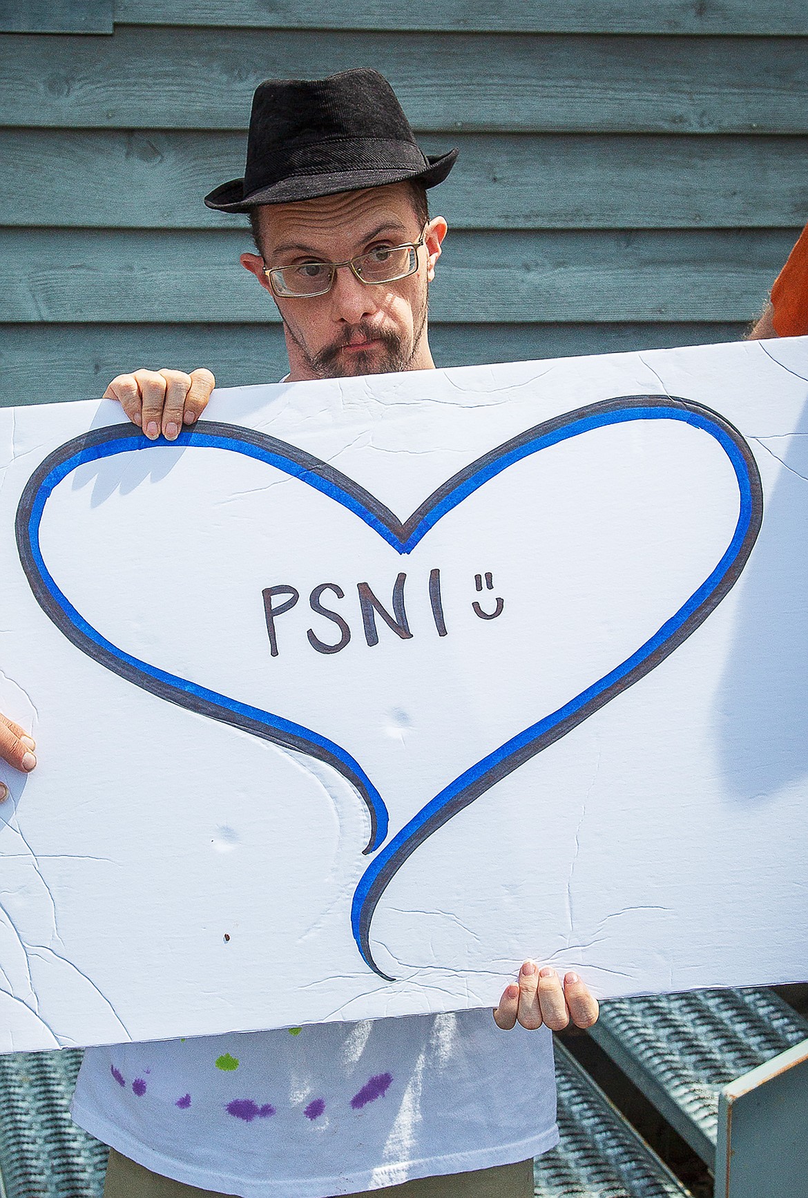 A Panhandle Special Needs, Inc. participant shows his love for the program with a sign. The Sandpoint non-profit is taking part in Idaho Gives in early May to raise fund to help with a planned move by the program.