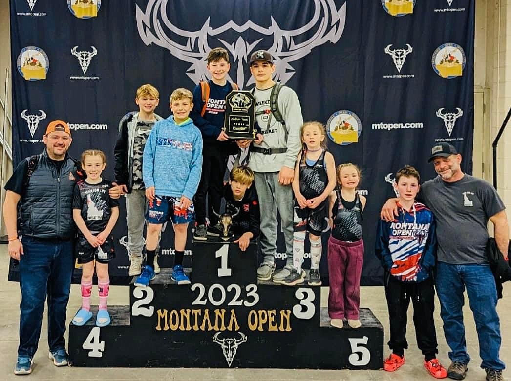 Courtesy photo
Team Real Life took first place at the Montana Open in Billings. From left are coach Jeremy Zender, Hartleigh Block (1st), Brayson Moore (5th), Damien Jarvis (2nd), Jude Zender (5th), Rowen Moore (3rd), Duane Leslie (1st), Neala Block (1st), Kleonna Block (1st), Weston Block (6th) and coach Norm Leslie.