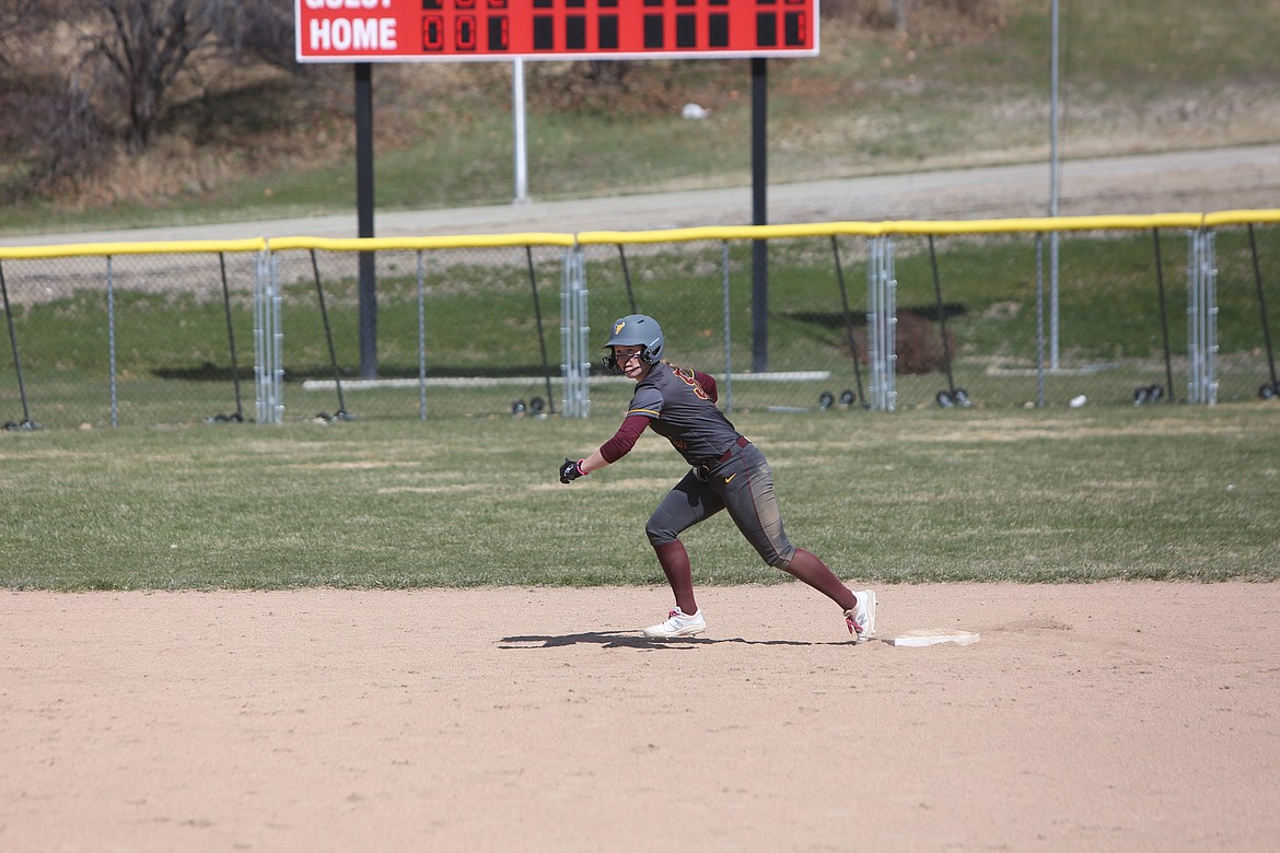 Moses Lake senior Ali Stanley gets ready to run to third base during the third inning of Saturday’s win over Othello. Stanley hit a walk-off double to end the game.