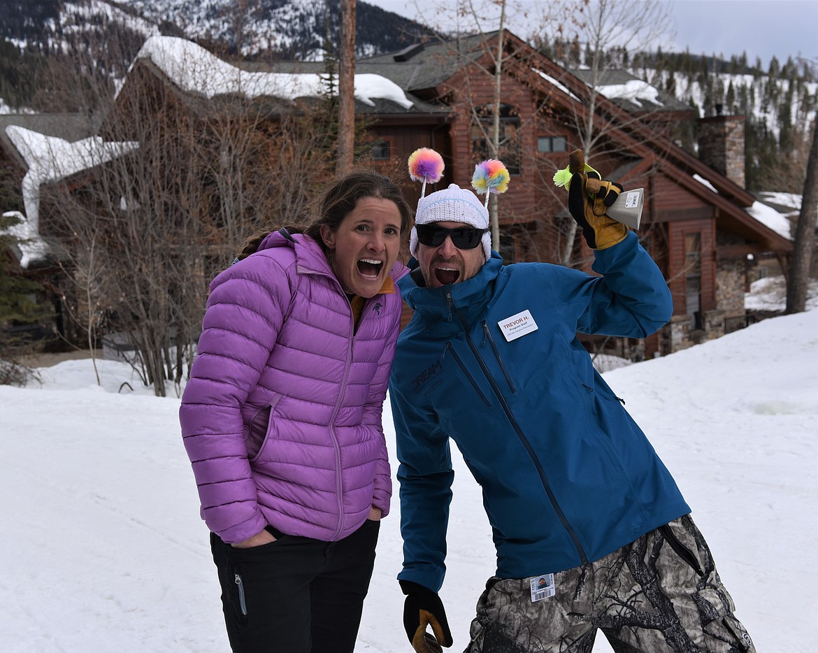 After completing 11 uphill laps in 10 hours, Janelle Smiley hams it up with DREAM Adaptive's Trevor Hildebrand at the Shred-a-thon party Saturday. (Julie Engler/Whitefish Pilot)