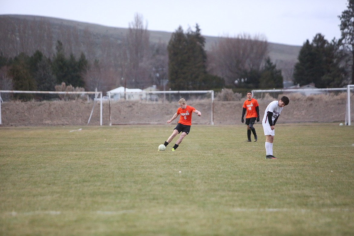 Ephrata senior Hudson Sager (6) kicks the ball deep against Grandview on Friday.