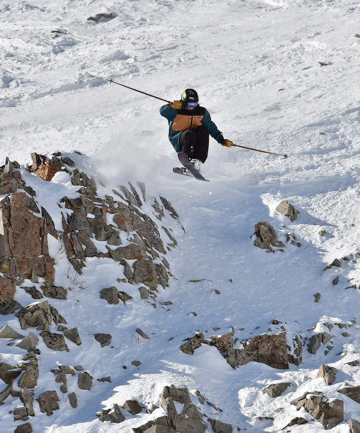 Bodie Mason jumps off a cliff during the Big Sky National Qualifier. (Image purchased by Chuck Mason from Crystal Images)