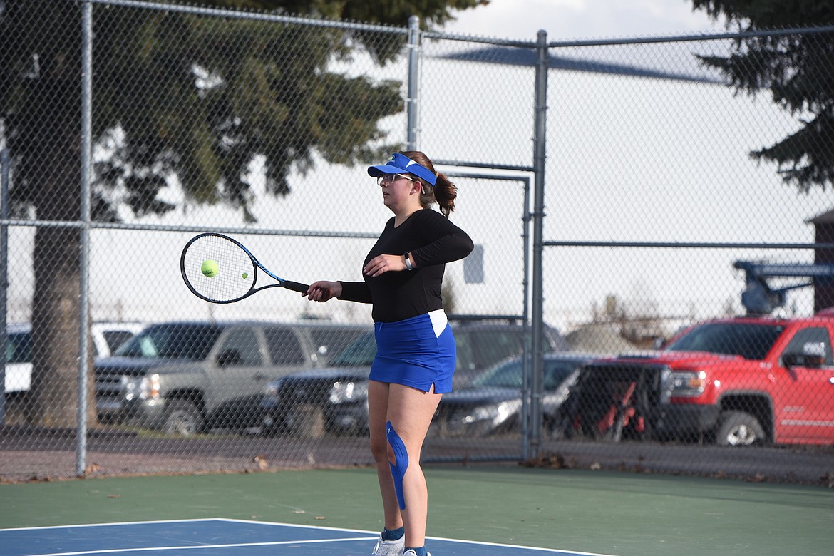 Libby's Kaitlyn Canary battles Columbia Falls' Zoey Byrd on Tuesday, April 6, 2023. (Scott Shindledecker/The Western News)