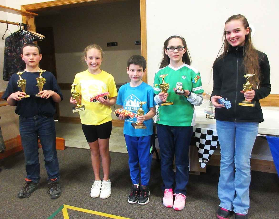 (T&T winners-green/white shirt) Speed winners, (left) Wyatt Frederico, first; Addie Merrifield second; Weston Teele, third; and design winners Liesl Dice, first; Wyatt Frederico, second; and Lindy Teele, third.