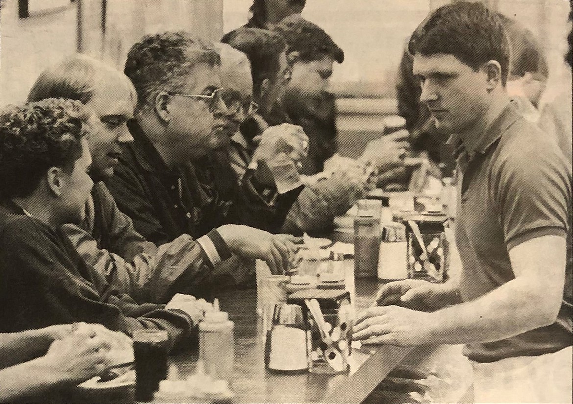 Steve Hudson, right, tends counter in spring 1993 after Best of the West names Hudson’s Hamburgers a top burger place.