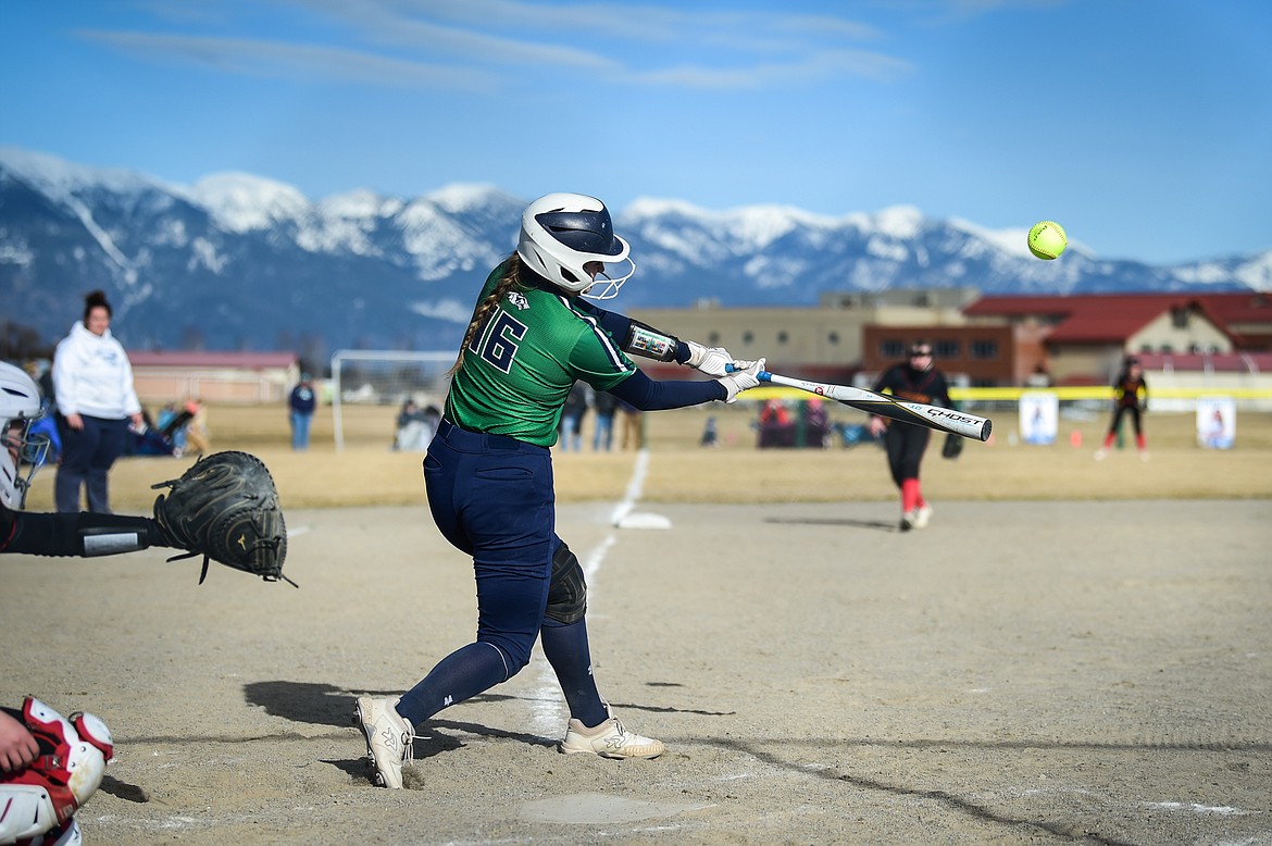 Glacier's Avery Anderson (16)) drives in Khristen Terrell (9) in the first inning against Missoula Hellgate at Glacier High School on Thursday, April 6. (Casey Kreider/Daily Inter Lake)