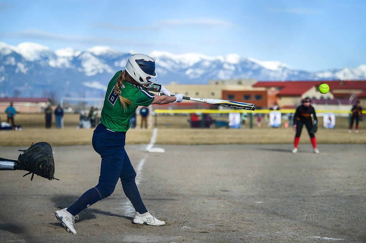 Glacier's Nakiah Persinger (8) connects on a single in the third inning against Missoula Hellgate at Glacier High School on Thursday, April 6. (Casey Kreider/Daily Inter Lake)