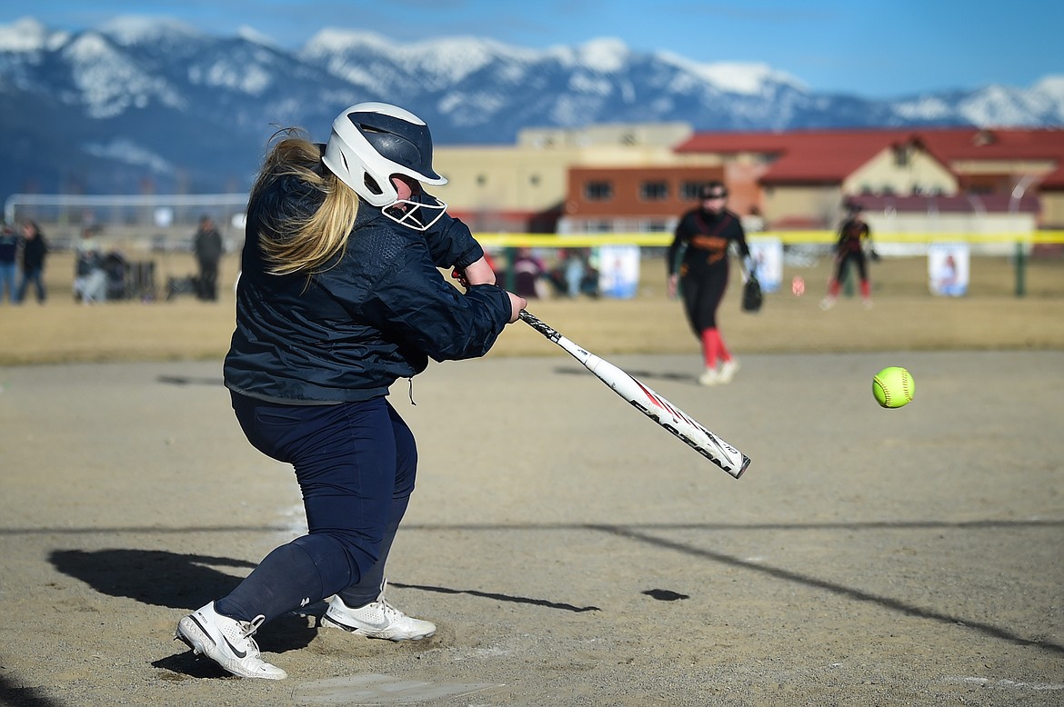 Glacier's Paishance Haller (27) drives in a run in the third inning against Missoula Hellgate at Glacier High School on Thursday, April 6. (Casey Kreider/Daily Inter Lake)