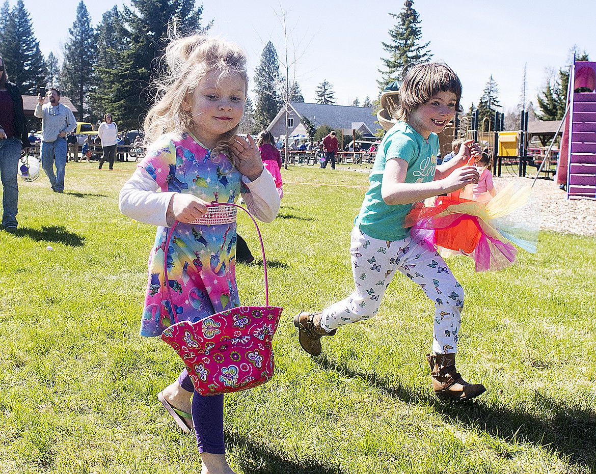 Youngsters race for candy during the Lions Club Easter egg hunt Sunday at Marantette Park in 2017. (Hungry Horse News photo)