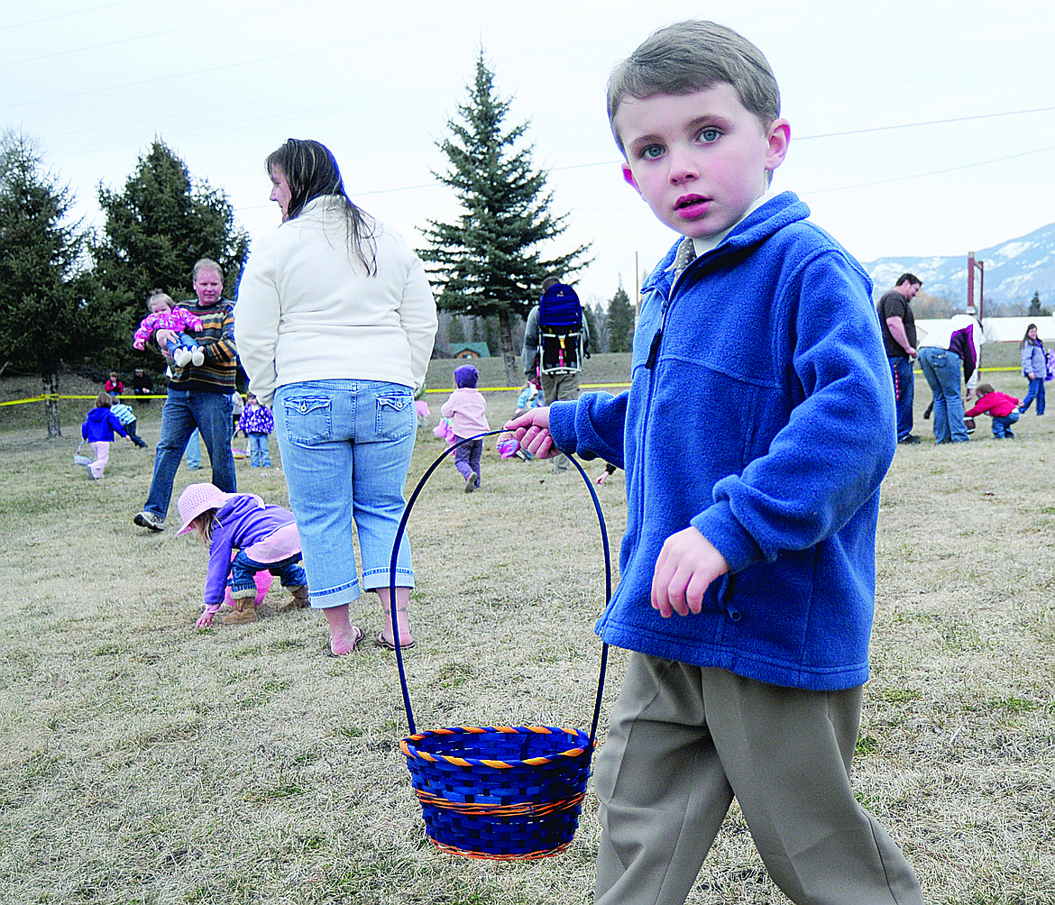 A youngster looks for eggs at the 2008 Lions Club Easter egg hunt. (Hungry Horse News)