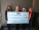 Silverwood donates $10K to 3Cs ahead of fashion show