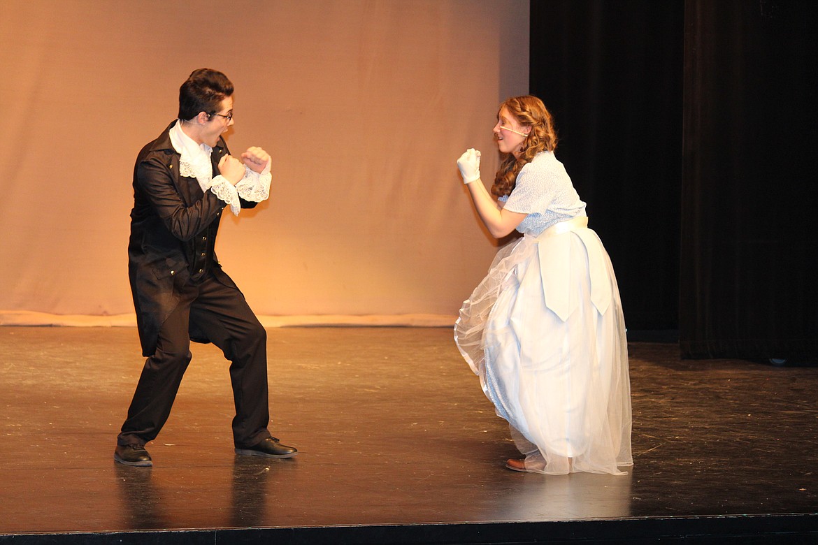 Laurie (Ryan Hone), left, and Jo (Madeline O’Neil) right, square off in the Moses Lake High School production of “LIttle Women.”
