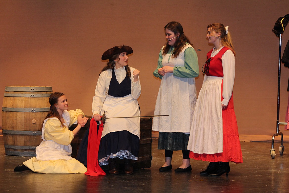 A costumed Jo (Madeline O’Neal), second from left, talks her sisters, from left, Amy (Paisley Ashton), Beth (Calissa Dalton) and Meg (Evan Arledge), into performing her thrilling play. The Moses Lake High School production of “Little Women” opens Friday.