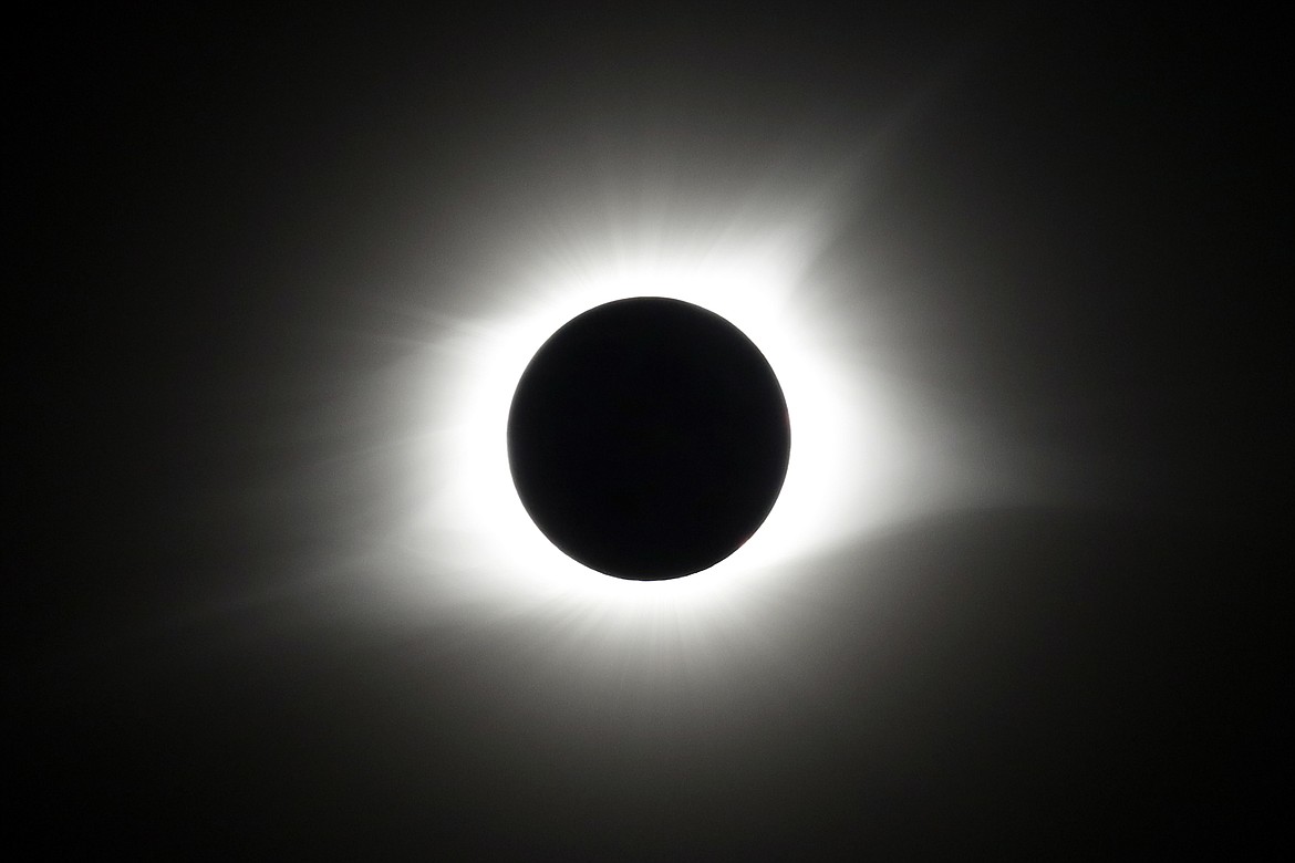 The period of total coverage during the solar eclipse is seen near Hopkinsville, Ky. Monday, Aug. 21, 2017. The location, which is in the path of totality, is also at the point of greatest intensity. It’s only a year until a total solar eclipse sweeps across North America. On April 8, 2024, the moon will cast its shadow across a stretch of the U.S., Mexico and Canada, plunging millions of people into midday darkness. (AP Photo/Mark Humphrey, File)