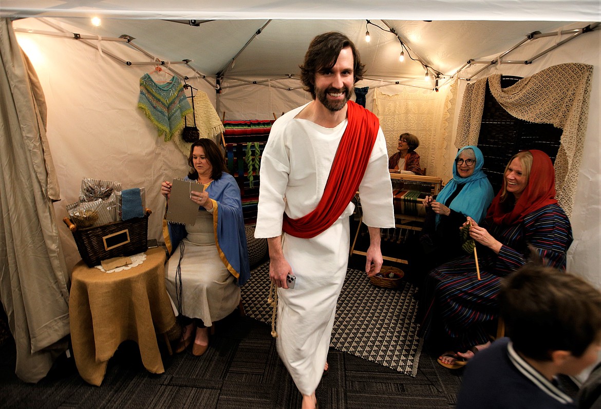 Kevin Schultz, who portrays Jesus in the Coeur d'Alene Seventh-day Adventist Church play "War in Heaven," visits the Bible Village on Friday.