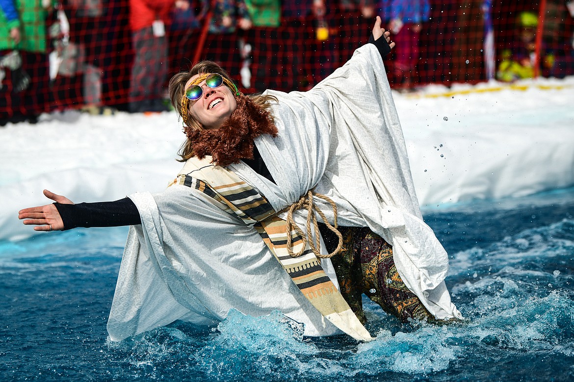 A competitor comes up short of successfully crossing the water at Whitefish Mountain Resort's pond skim on Saturday, April 8. (Casey Kreider/Daily Inter Lake)