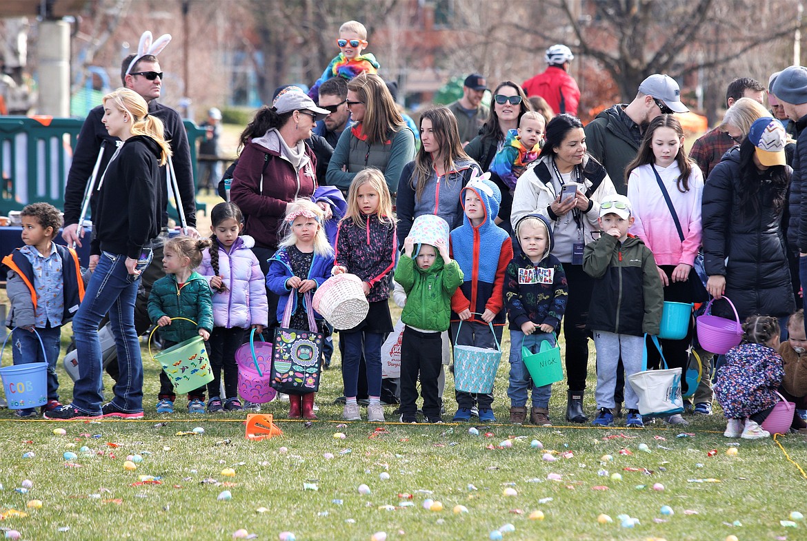 Kids wait for an Easter egg and candy hunt to begin at McEuen Park on Saturday. The event, put on by Real Life Ministries, attracted about 500 kids who quickly collected all the candy on the field.