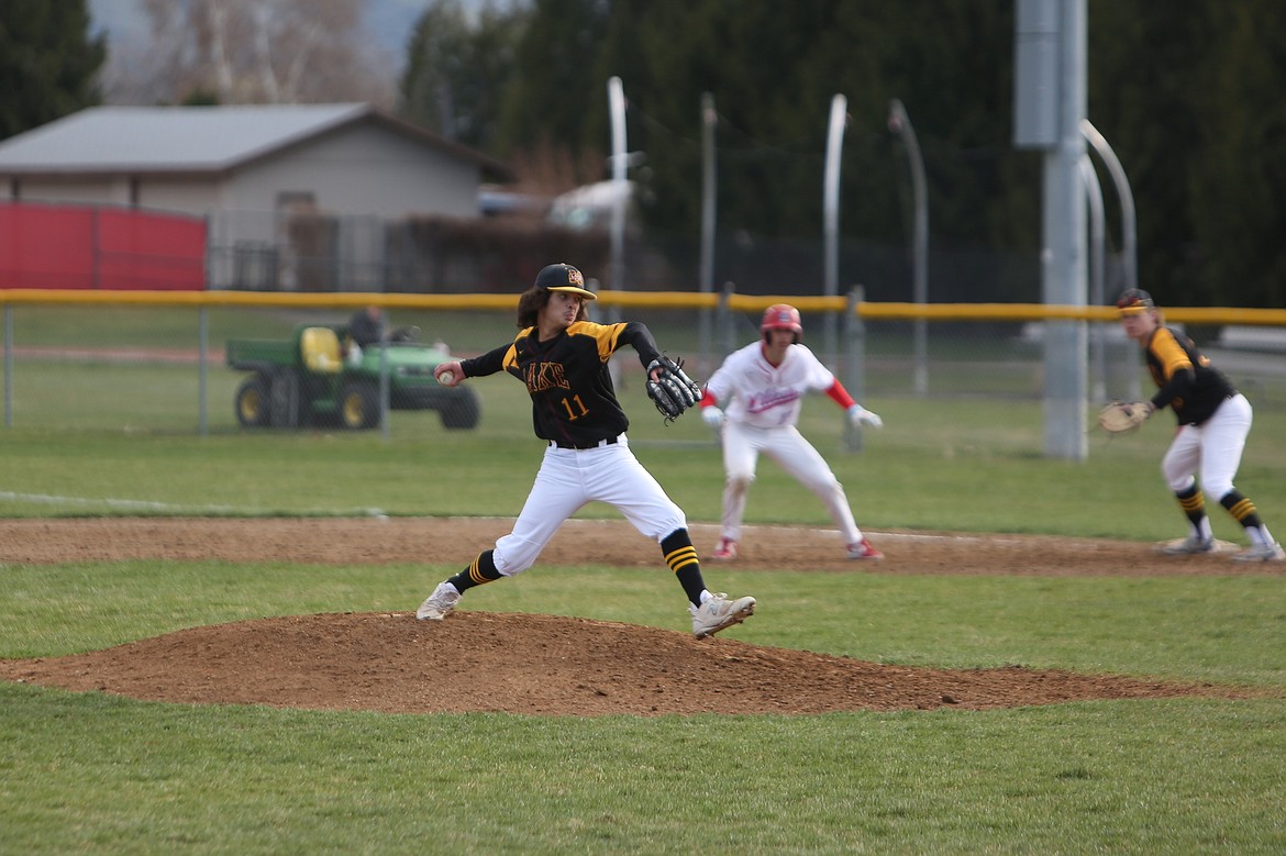 Moses Lake senior Kaiden Valdez goes through his pitching motion against Eastmont on Friday.