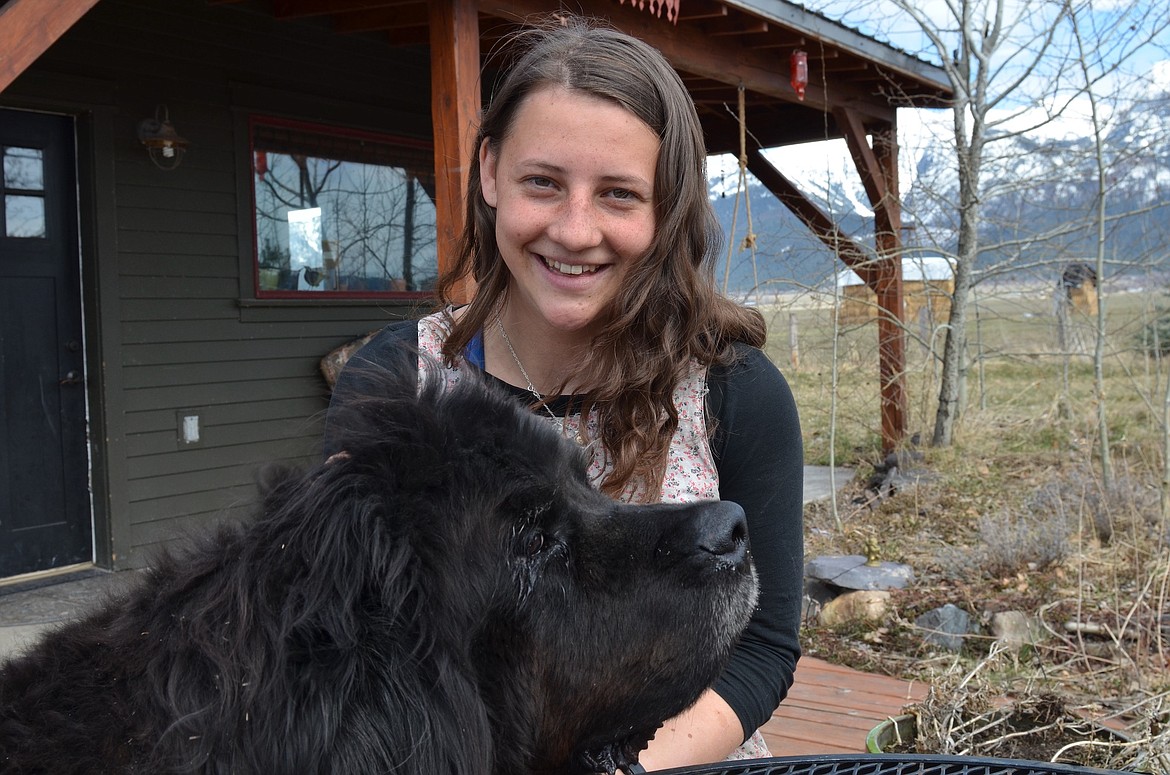 Natalie Helser with her big buddy, Jocko the Newfoundland. (Kristi Niemeyer/Leader)