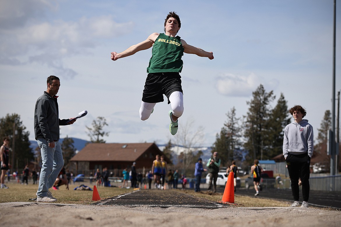 Whitefish's Morgan Kyle competes in the long jump at the Bigfork Invite on Saturday. (Jeremy Weber/Bigfork Eagle)