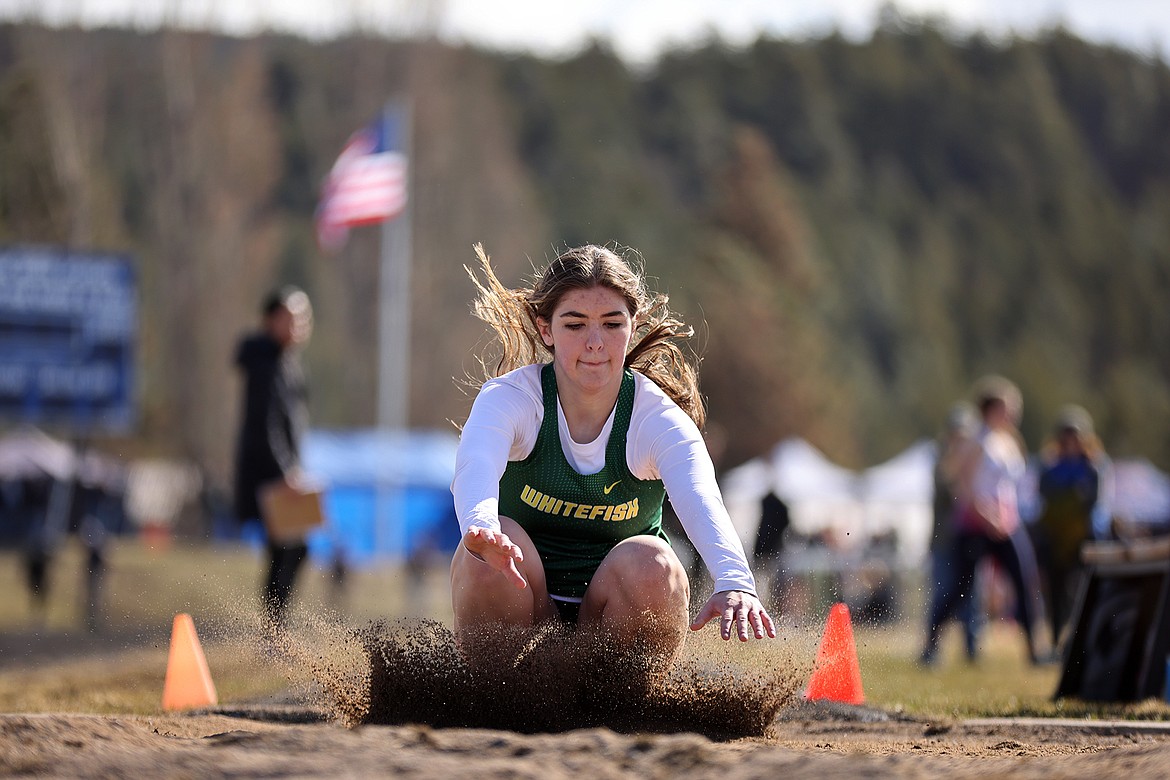 Nayvee Miller competes in the long jump at the Bigfork Invite on Saturday. (Jeremy Weber/Bigfork Eagle)