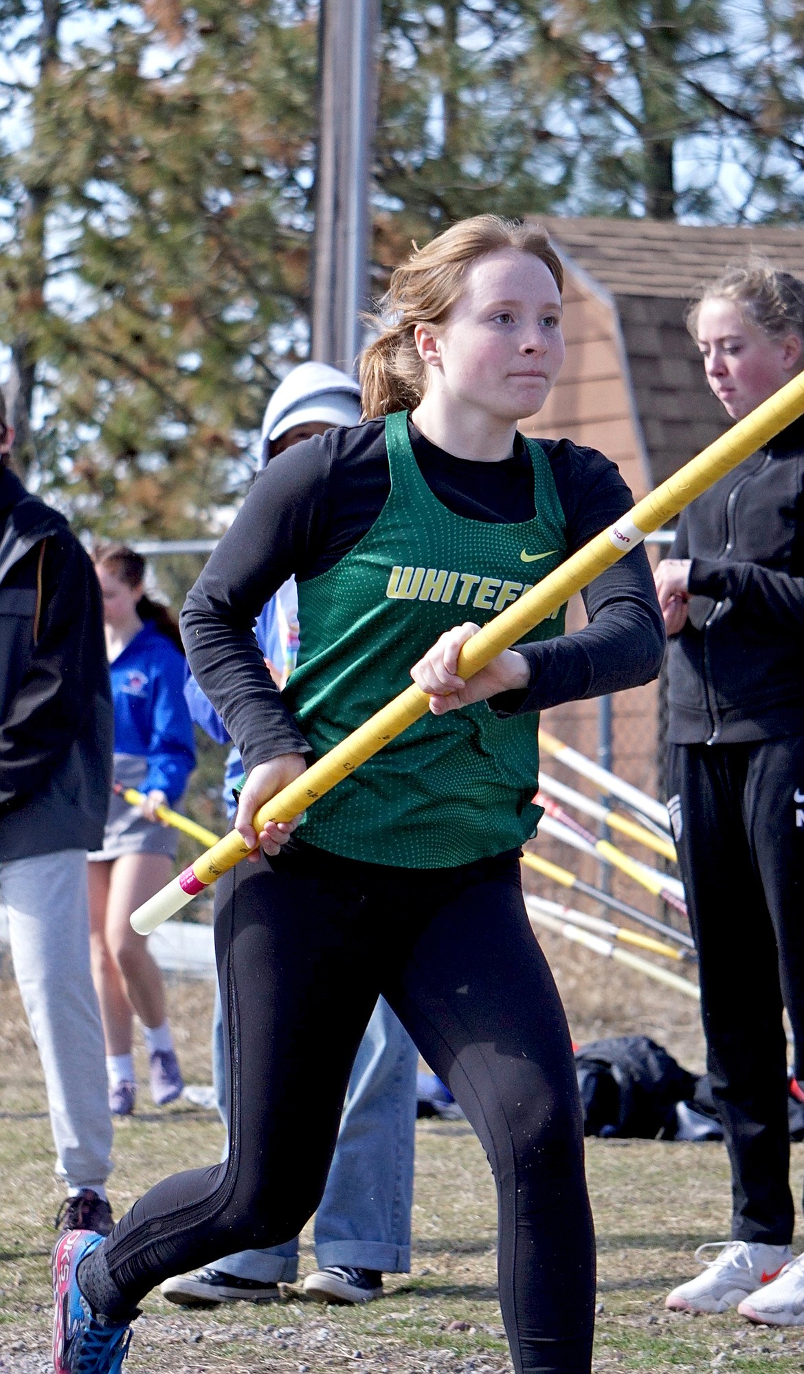 Whitefish sophomore Georgia Morrell competes in the pole vault in Bigfork on Saturday. (Matt Weller photo)