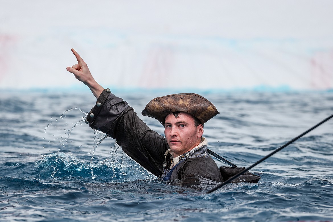 A competitor in the Pond Skim swims to shore. (JP Edge photo)