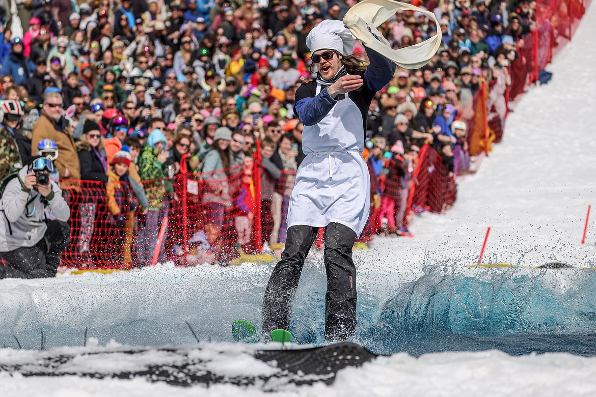 A competitor does the pond skim while flipping pizza dough. (JP Edge photo)