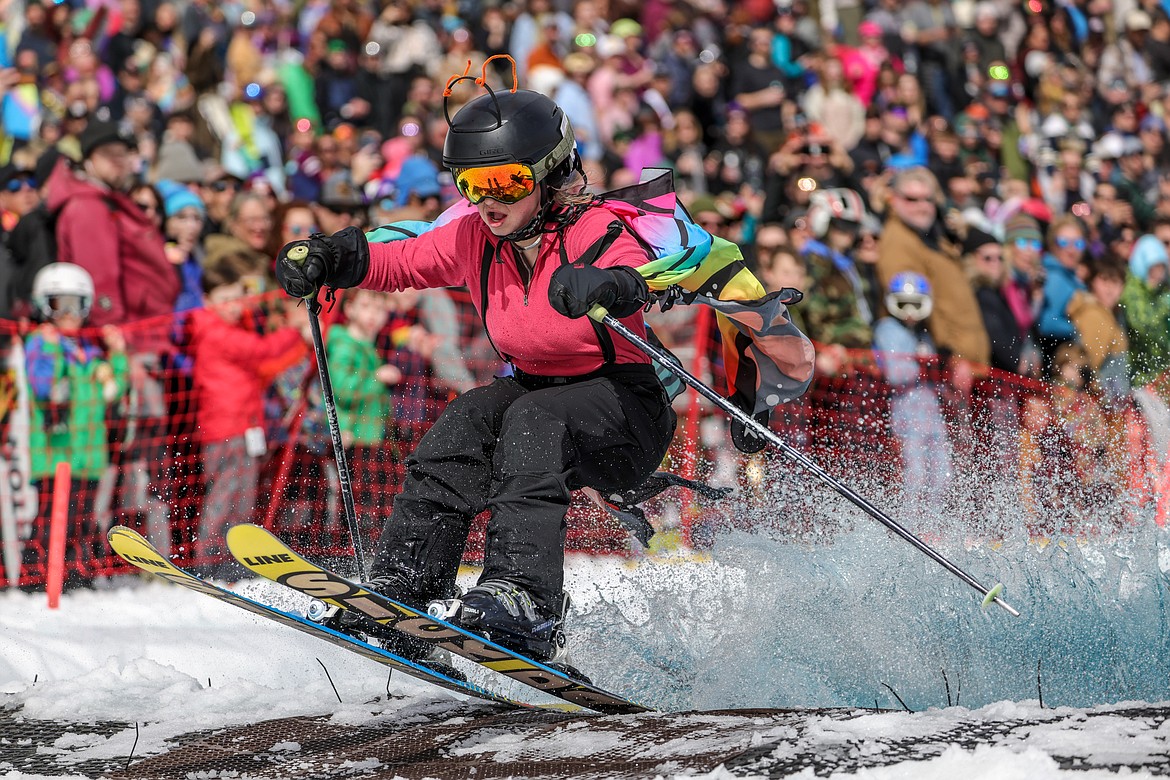 A competitor navigates across the pool at the Pond Skim on Saturday. (JP Edge photo)