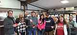 CJ's Custom Meats cuts ribbon
